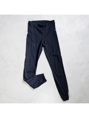 Vuori Black Mid-Waisted Leggings with Pockets Size XS
